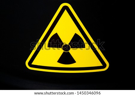 Sign of radiation on a black barrel