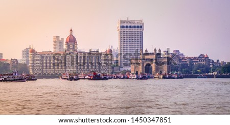 Panoramic view of Mumbai cityscape & Gateway of India from harbour at Maharashtra, India. Royalty-Free Stock Photo #1450347851