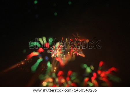 Abstract glitter defocused bokeh background. Blurry lights.