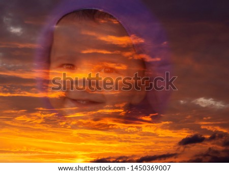 Double exposure portrait of a baby girl. Cloudy sky at sunset. Art design photography.