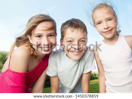 Happy children outdoors. Friends at summer