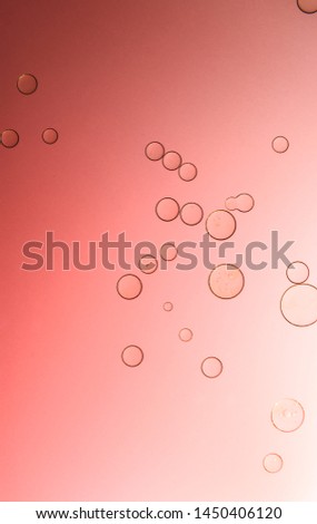 Abstractive circles on a pink gradient background