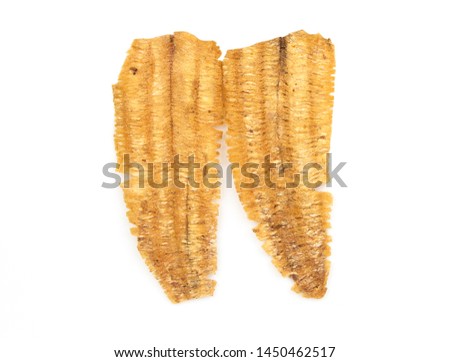 Dried roller seasoned cuttlefish.Sweet and spicy seafood snack.Isolated on white background.Pictures can be used to  food articles containing dried squid as a component.