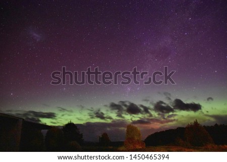 A brilliant Aurora Australis, or Southern Light display that lights up the southern skies of the remote village of Te Anau Downs.