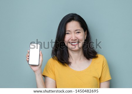 Mockup image screen cell phone.women hand holding texting using mobile.with copy space,white blank space for advertise text.concept for contact business,people communication,technology device