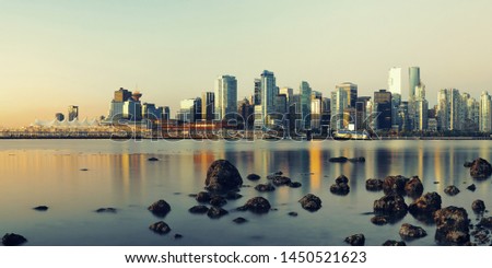 Vancouver downtown with urban buildings at waterfront.