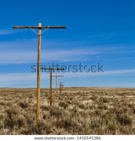 Power Lines Along Historic Route 66 Royalty-Free Stock Photo #1450545386