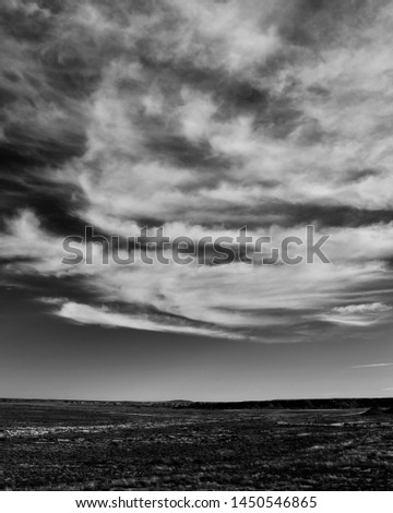 Clouds Over Petrified Forest National Park, Arizona Royalty-Free Stock Photo #1450546865