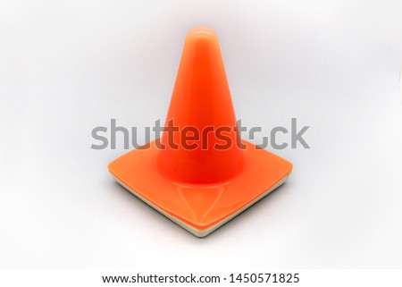 A cone of traffic and signage.