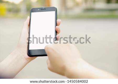 Woman using her Mobile Phone