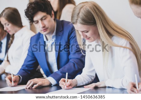 Business people working with documents in conference room
