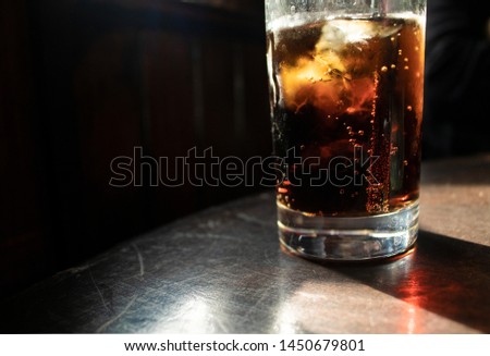 cold drink on a dark table Royalty-Free Stock Photo #1450679801