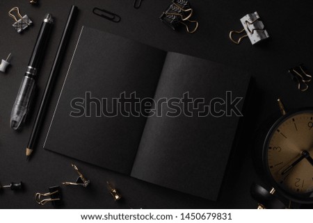 Layout with black blank notepad for inscription or design, black style. Mockup