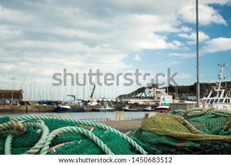 old urban harbour on a sunny day Royalty-Free Stock Photo #1450683512