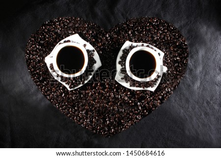 A heart filled with coffee beans