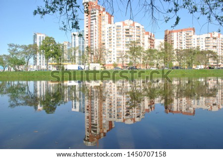 St. Petersburg, city, high-rise building, pond, park. Royalty-Free Stock Photo #1450707158