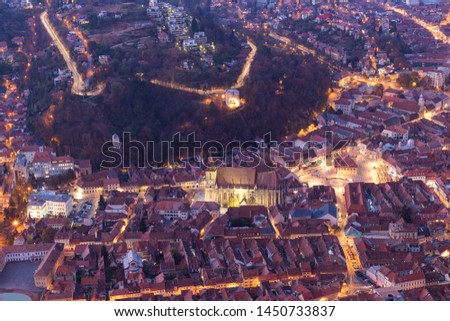 Brasov, Romania: Panoramic view of the city center from Tampa Mountain at dusk
