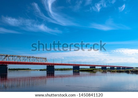 road and railway bridge at sunset