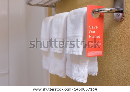 Save water sign label on hotel encourage guest reuse bath towel