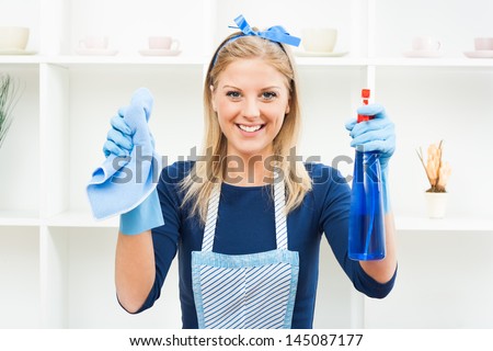 Young housewife is ready for cleaning,It is time for cleaning Royalty-Free Stock Photo #145087177