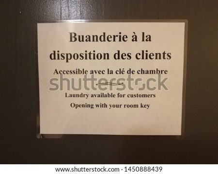 laundry available for customers sign in French and English