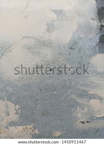 background and texture dark metal surface with putty putty close-up shot with real natural photography