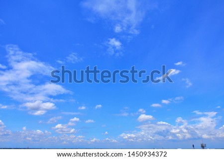 Blue sky background with clouds on morning in rainy season Refresh Sky ,or summer sky ,The image of a cloudy sky in the morning of a beautiful rainy season , 