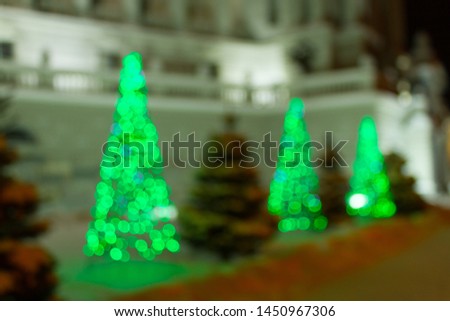 blurred image of a christmas tree on the street