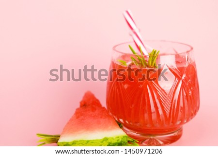 Summer cocktail. Ingredients:  watermelon juice, rosemary. Watermelon drink.