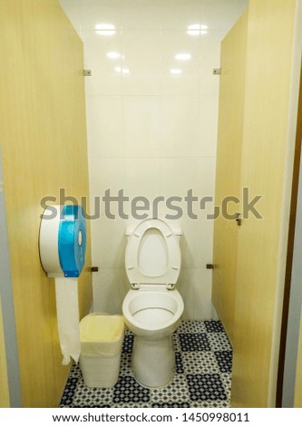 Bathroom with toilet paper, blurred background