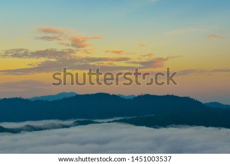 twilight sky in the morning and white sea of mist flow