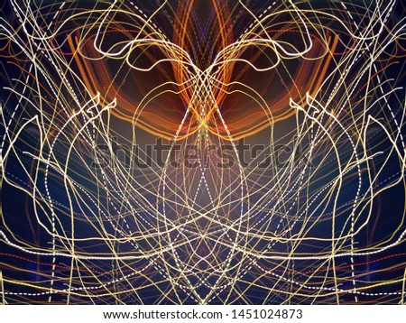 Light effects. Neon glow. Symmetry and reflection. Festive decoration. Abstract blurred background. Glowing texture. Shining pattern.