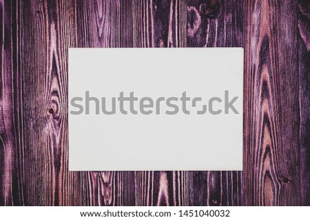 paper sheet on wooden background top view, Place for your text