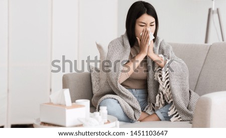 Ill Girl Has Runny Nose, Sneezing and Blowing her Nose into Paper Napkin, Free Space