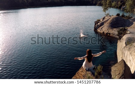 Back View Young Woman Sitting Rock Looking Beautiful Crater Lake Stock Image