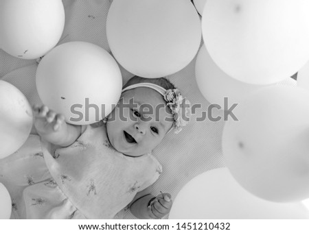 This is my baby. Sweet little baby. New life and birth. Childhood happiness. Small girl. Happy birthday. Family. Child care. Childrens day. Portrait of happy little child in white balloons.