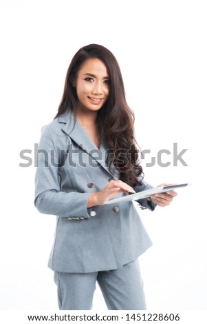 Standing Woman The tablet wore gray work clothes on a white background.