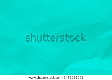 Macro photo of turquoise paper texture for background
