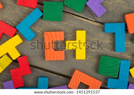 Creative solution for idea - business concept, jigsaw puzzle on the wooden background Royalty-Free Stock Photo #1451291537