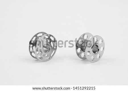 bobbin winder for sewing machine thread Royalty-Free Stock Photo #1451292215