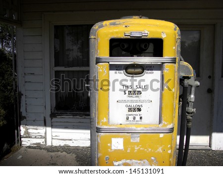  aged and worn vintage photo of old gas pump
