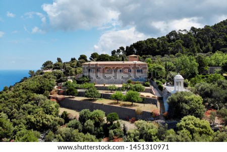 Aerial photo popular place for wedding venue old building exterior on hill white arbour for beautiful holiday celebration, picturesque landscape near Mediterranean Sea on mountain top, Majorca Spain