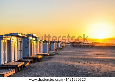 The beach huts - Plage de Calais, Northern France Royalty-Free Stock Photo #1451350523