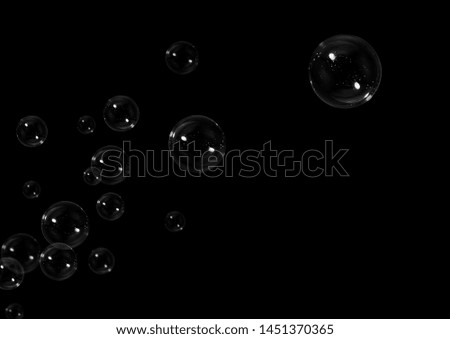 bubbles abstract background. soap bubbles floating on black background.