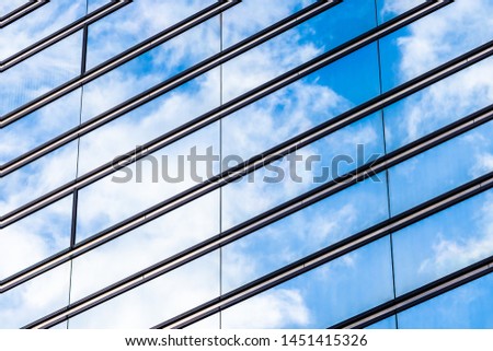Beautiful architecture skyscraper office business building with glass window shape