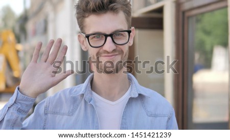 Hello, Welcoming Casual Young Man Standing Outdoor