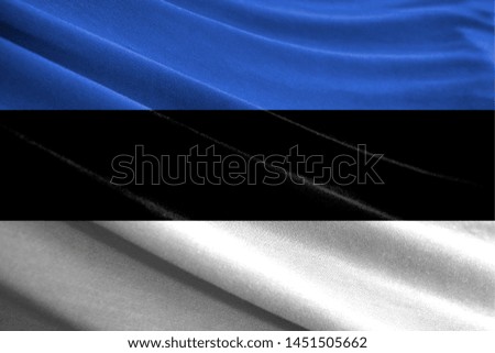 Realistic flag of Estonia on the wavy surface of fabric