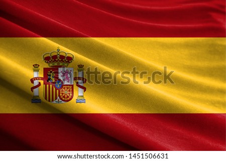 Realistic flag of Spain on the wavy surface of fabric Royalty-Free Stock Photo #1451506631