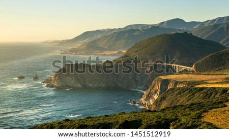 The Pacific coast and Bixby Creek Bridge in Pfeiffer Big Sur State Park between Los Angeles and San Francisco in California Royalty-Free Stock Photo #1451512919