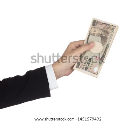 Businesswoman giving money and holding 10,000 japanese yen money Isolated on white background